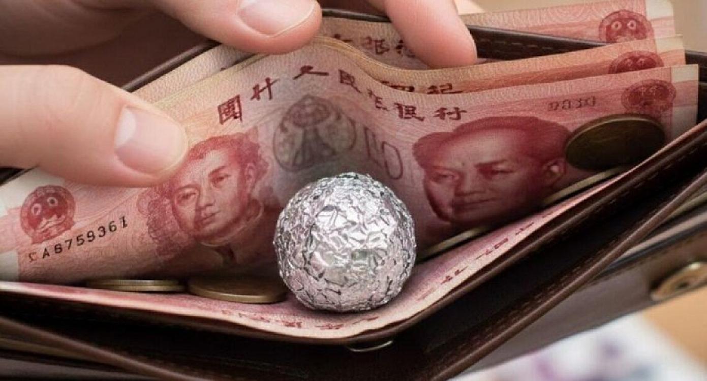 Çinlilər niyə pul kisələrində alüminium folyo daşıyır?