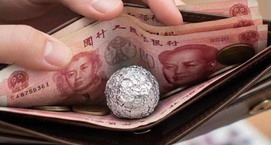 Çinlilər niyə pul kisələrində alüminium folyo daşıyır?