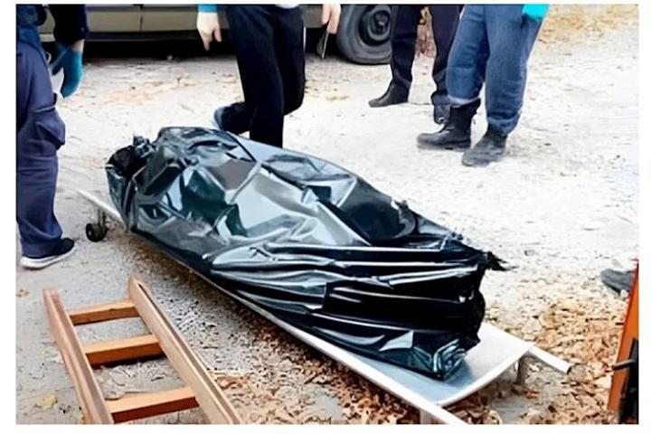 Qadını öldürüb meyitini 14 il 