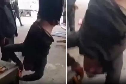 ŞOK GÖRÜNTÜLƏR: Əqli qüsurlu kişini ayağından asdılar - 