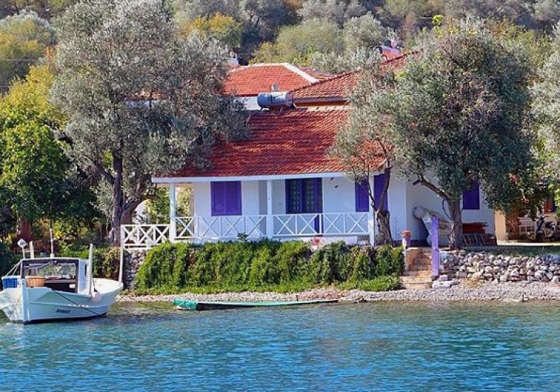 Dünyanın ən kiçik yaşayış məntəqəsi: Adada cəmi bir ev və bir ağac var