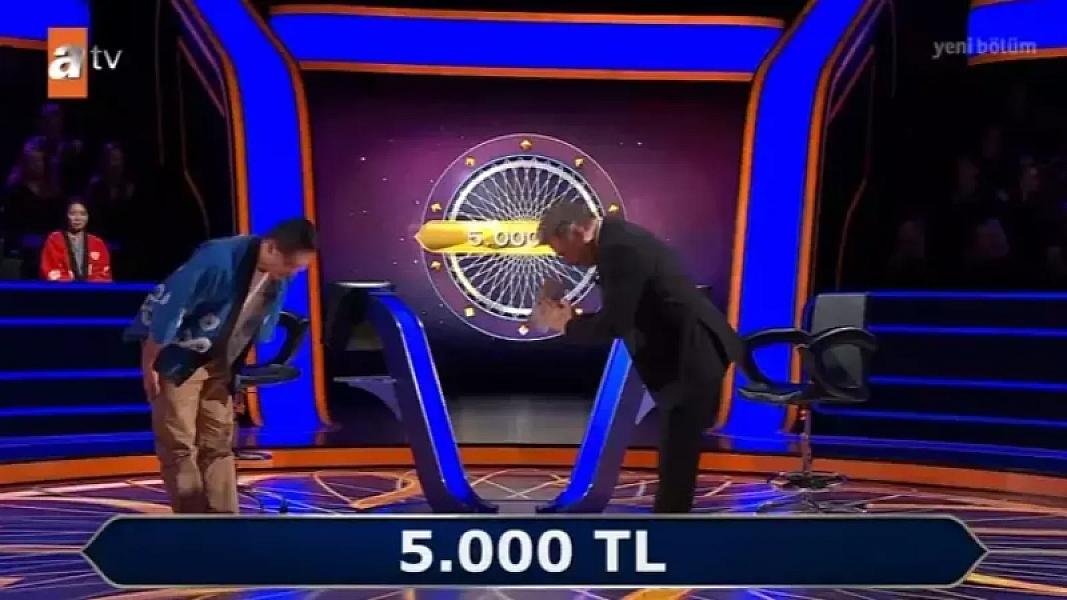 milyonerde_kimsenin_beklemedigi_hareket_japon_yarismaci_yere_kapandi_1775201347_7926_w735_h404