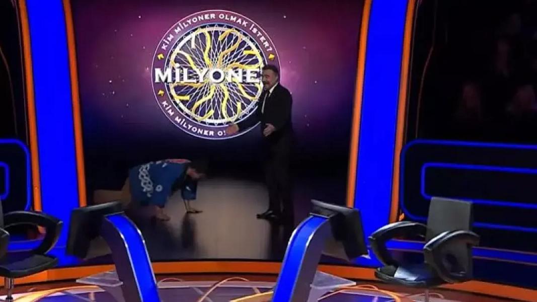 milyonerde_kimsenin_beklemedigi_hareket_japon_yarismaci_yere_kapandi_1775200813_7193_w748_h435