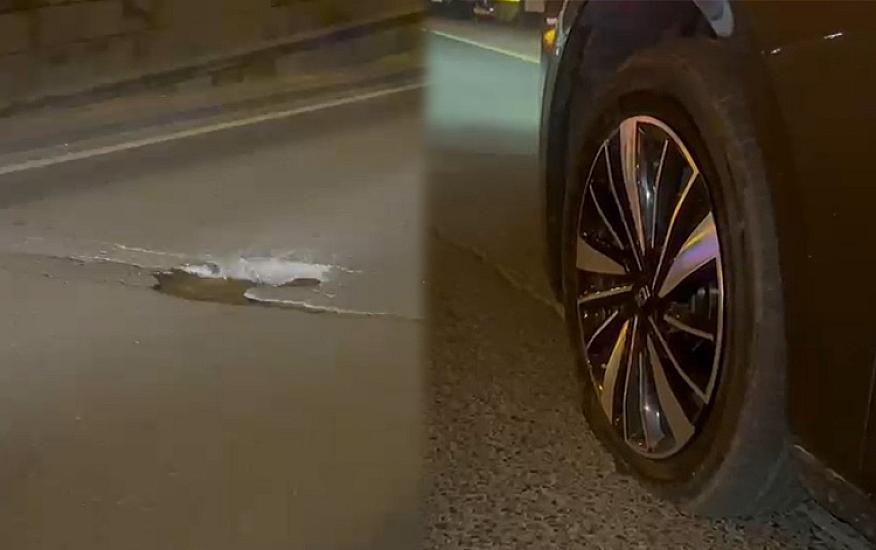 Prospektdəki bu çuxura düşən maşınların təkəri partlayır - 