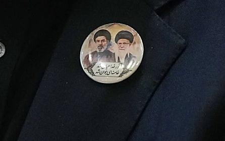 The lapel pin became a topic of discussion -