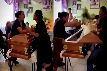 Sevgililərinin tabutu üstündə