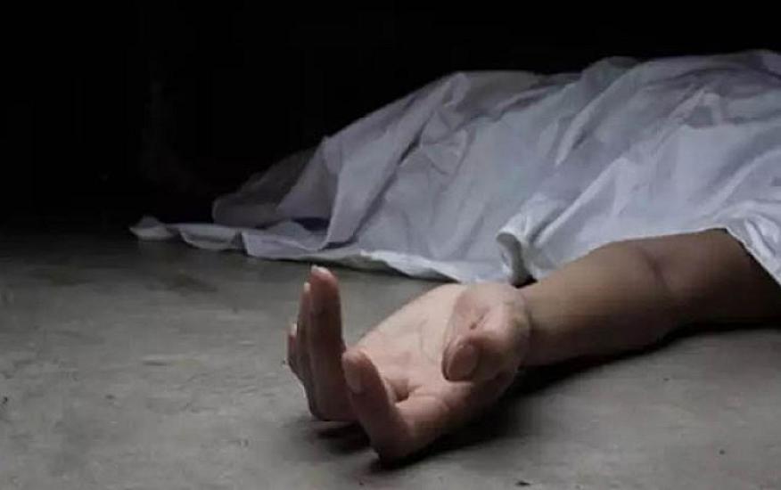 A 28-year-old person in the store where they work