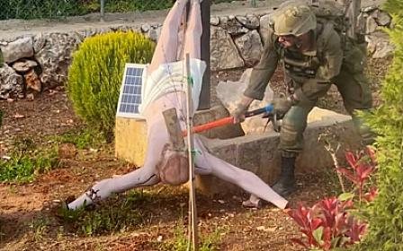 The Israeli soldier destroying the statue of Prophet Jesus