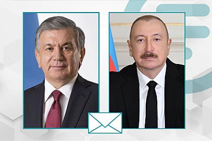 Şavkat Mirziyoyev İlham Əliyevi 