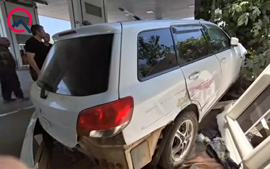 To the "Mitsubishi" gas station