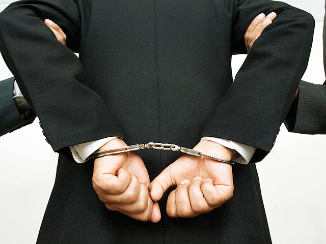 Businessman Being Arrested Royalty free: For comercial usage price on demand