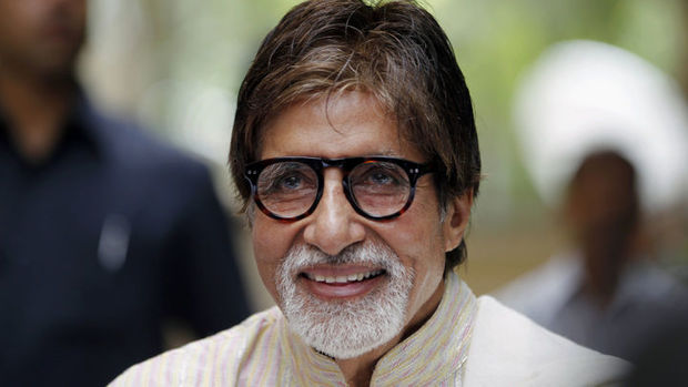 Bollywood actor Amitabh Bachchan smiles during media conference on his 71st birthday in Mumbai, India, Friday, Oct. 11, 2013. Popularly known as "Big B," Bachchan has acted in more than 180 Indian films in a career spanning four decades. (AP Photo/Rajanish Kakade)