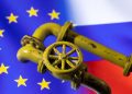 FILE PHOTO: 3D printed natural gas pipes are placed on displayed EU and Russian flags in this illustration taken, January 31, 2022. REUTERS/Dado Ruvic/Illustration/File Photo