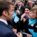 French President Emmanuel Macron argues with a person opposed to the pension reform, in Selestat, eastern France, Wednesday, April 19, 2023. French President Emmanuel Macron said Monday April 17, 2023 that he heard people's anger over raising the retirement age from 62 to 64, but insisted that it was needed to keep the pension system afloat as the population ages. Emmanuel Macron is trying to repair the damage done to his public image and politics by forcing the pension plan through parliament last month. (Ludovic Marin, Pool via AP)